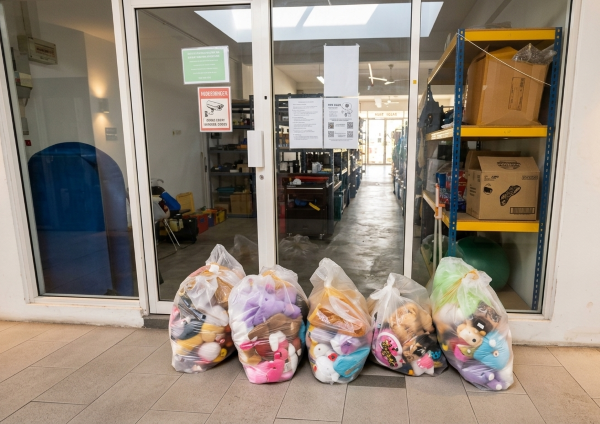 Well-packed donation toys successfully delivered in front of our door